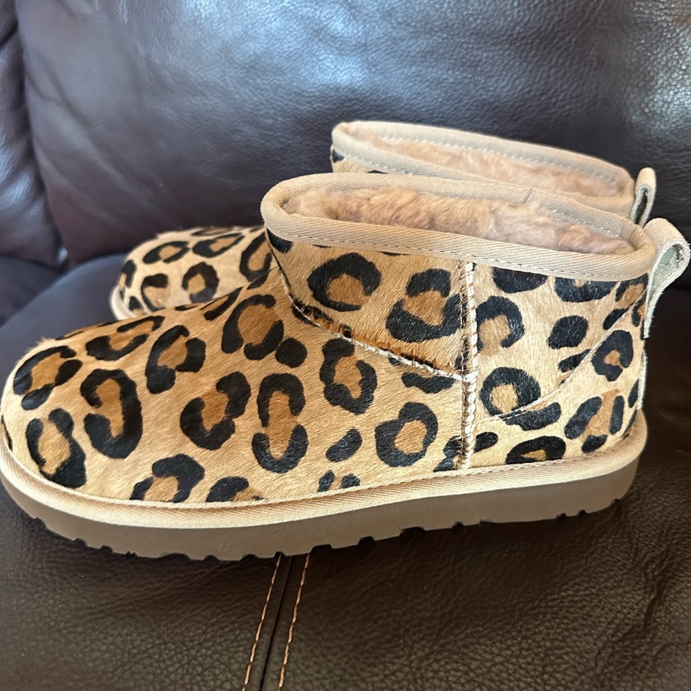 Ugg Leopard, Classic Ultra Mini Booties.  Never worn.  From Dillards